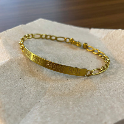 Esclava De Tumbaga Grabada Con El Om Mani Padme Hum Dorado 10 Cm 7 Cm by HEREJE